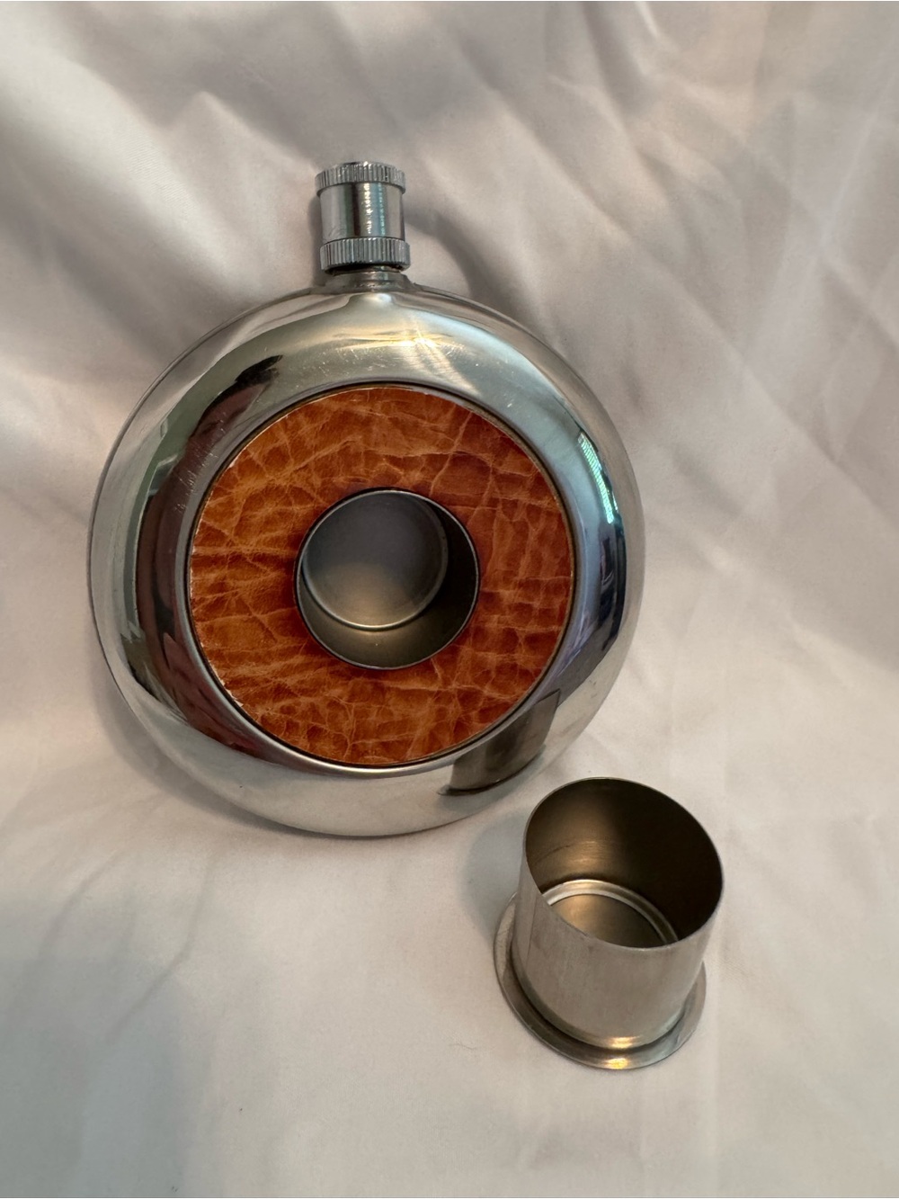Round Stainless Steel Flask with Brown Leather Accent